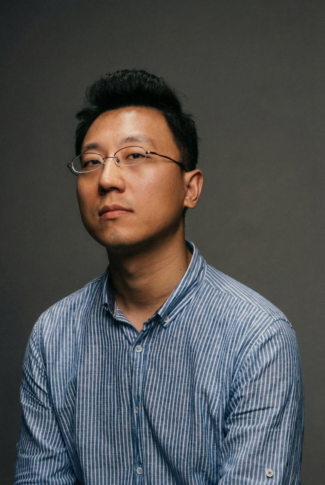 Portrait of He Fa, founder and curator of P4 Theater
