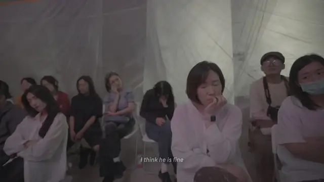 A shared viewing scene near the end of the film, 02:26:59.
